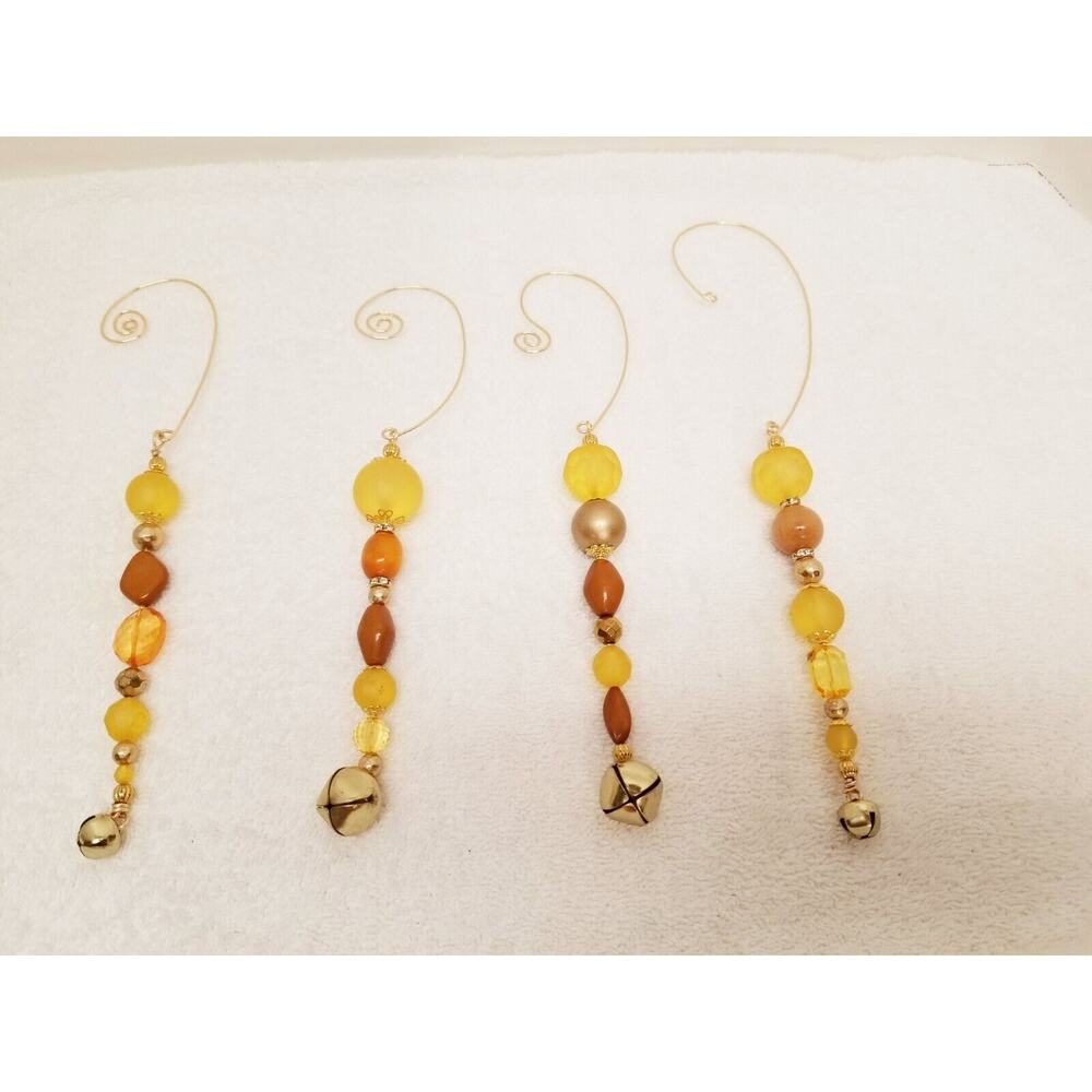 Four golden Christmas icicle ornaments c9